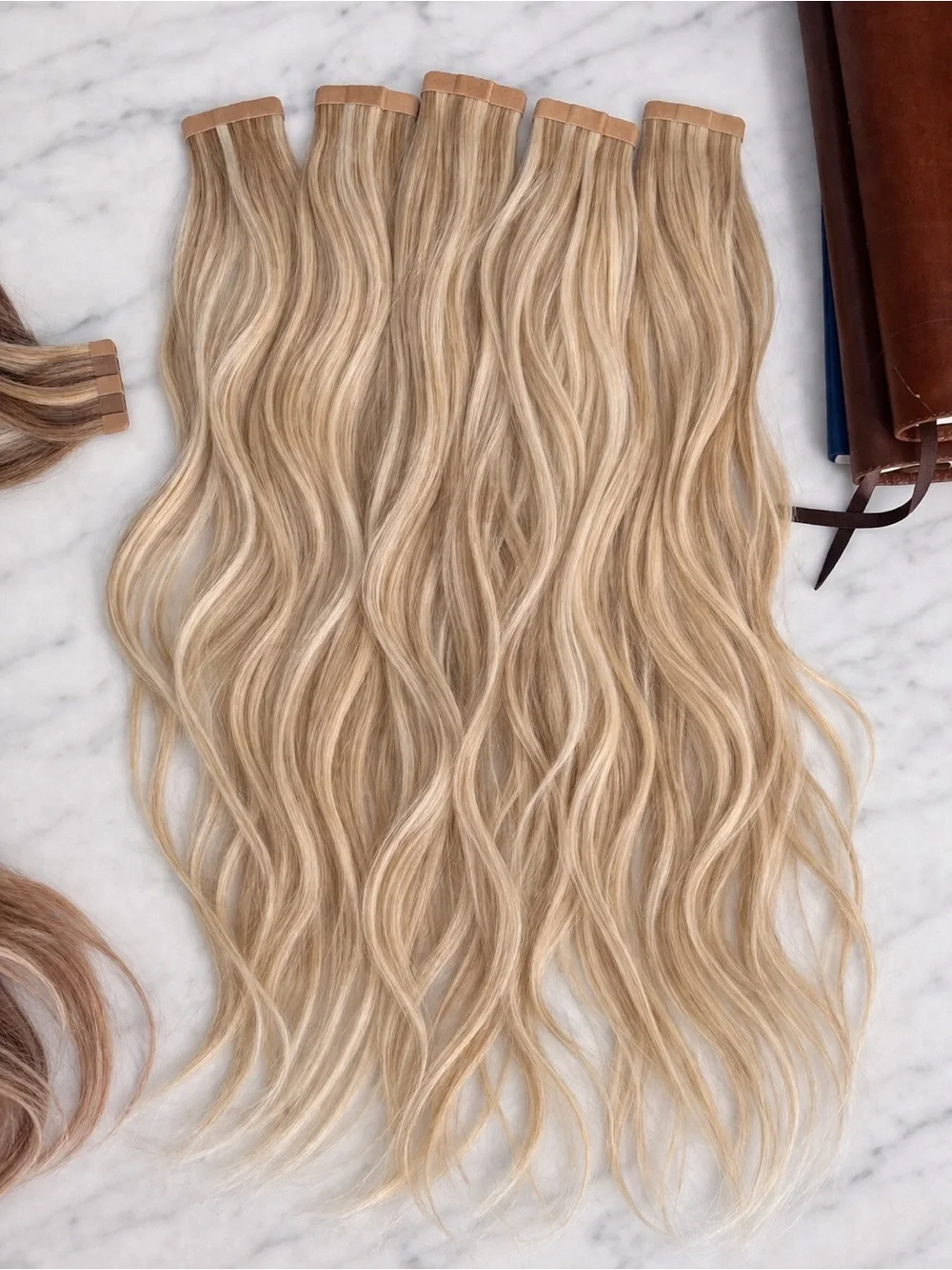 20” Bombay Blonde Tape-In Hair Extensions 4 packs.